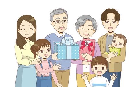 祖父と祖母にプレゼントを渡す家族