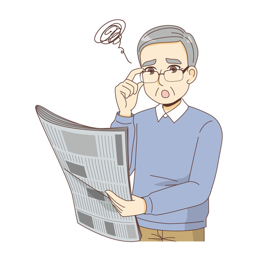 老眼で新聞の文字が見えにくい男性高齢者（その他高齢者の病気/医療・病気）