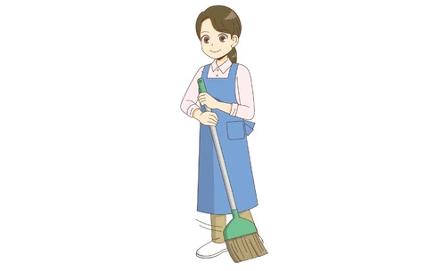 ホウキで掃除をする女性ホームヘルパー