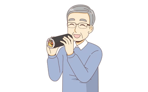 恵方巻を食べる男性高齢者