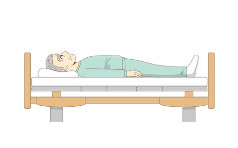 仰臥位（横から見た状態）（高齢者（おじいさん・おばあさん）/介護現場の人物）