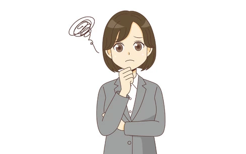 困っているスーツを着た女性（バストアップ）