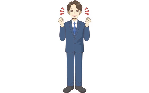 ガッツポーズするスーツを着た男性