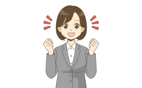 ガッツポーズするスーツを着た女性（バストアップ）