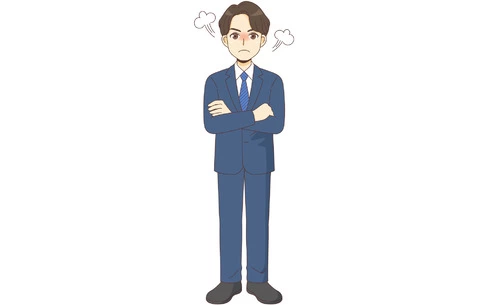 怒っているスーツを着た男性