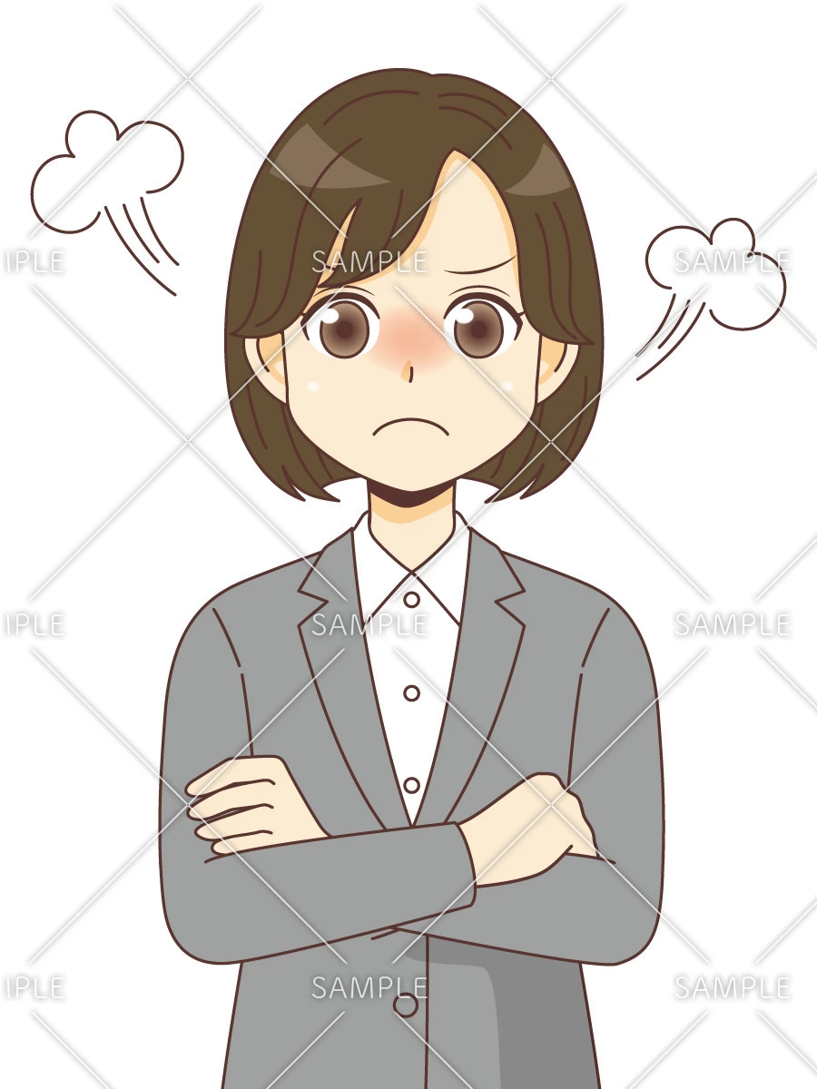 怒っているスーツを着た女性（バストアップ）