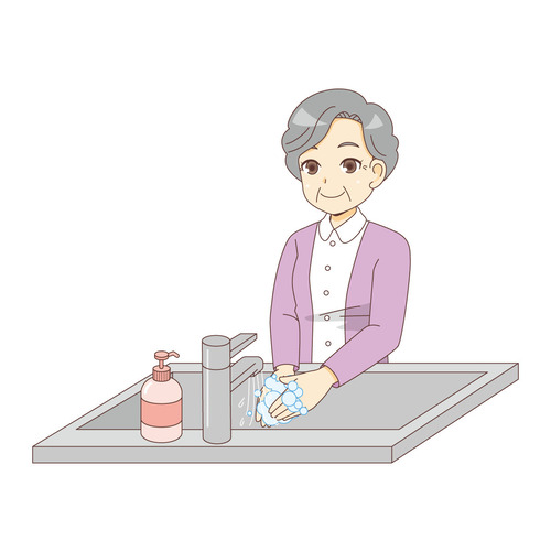 手を洗う女性高齢者（高齢者（おばあさん・おじいさん）/介護現場の人物）
