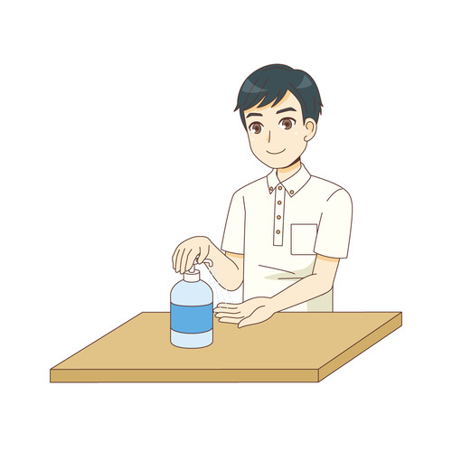 手を消毒する男性介護職（介護士・ヘルパー/介護現場の人物）