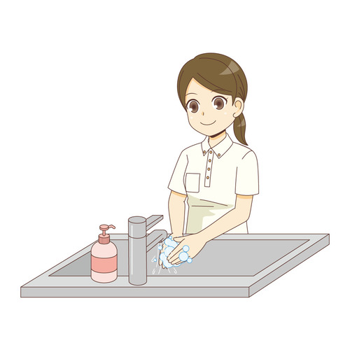 手を洗う女性介護職（介護士・ヘルパー/介護現場の人物）