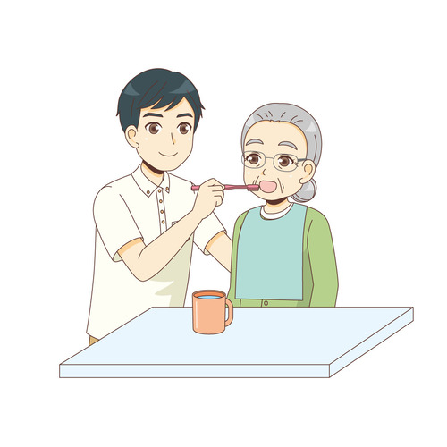 女性高齢者の口腔ケアを行う男性介護職（老人ホーム・介護施設/施設・サービス）